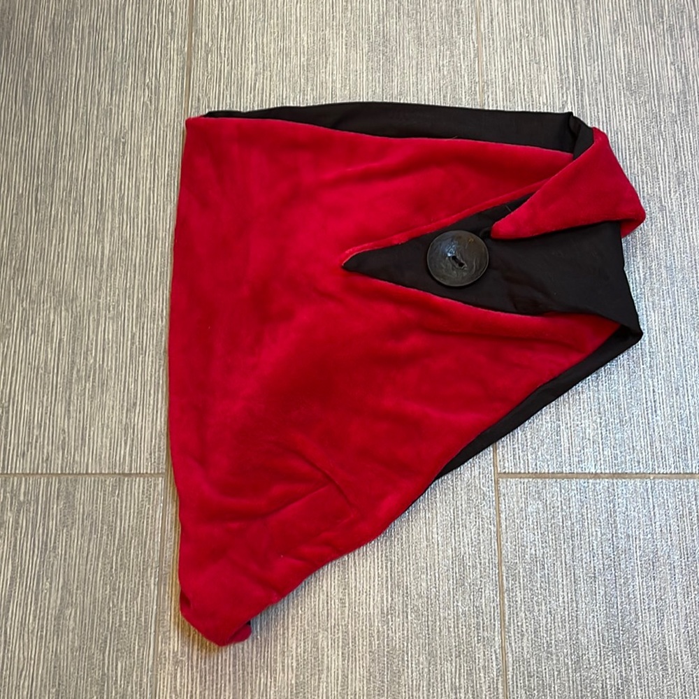 A red velvety shrug wrap to be worn in many ways one size fits all